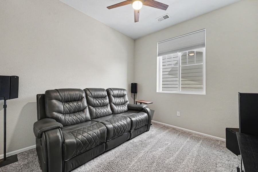 Bedroom set up as a media room