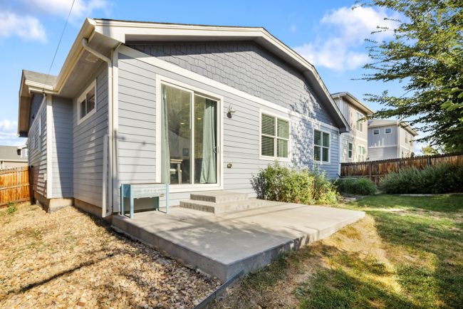 Concrete patio and fenced yard